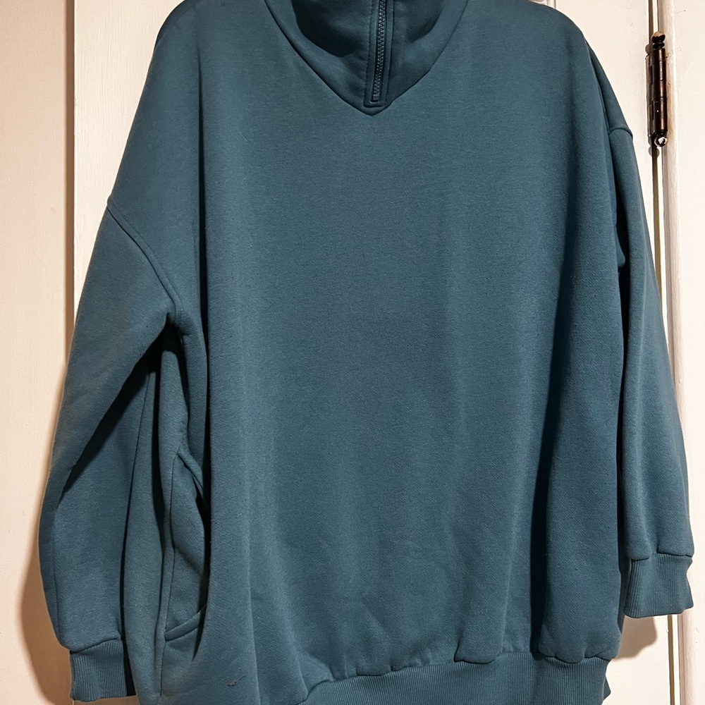 Woman’s Teal Sweatshirt